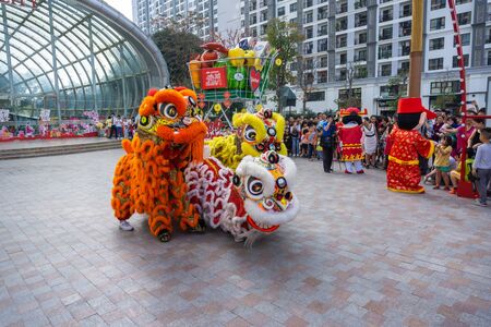Hanoi, Vietnam - Feb 25, 2019: A show of dragon and lion dance at Vincom Megamall Times City . This is a form of traditional dance and performance in Vietnamese cultureのeditorial素材