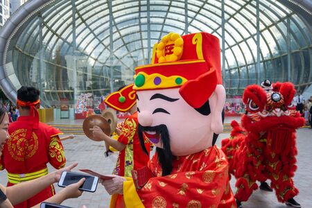 Hanoi, Vietnam - Feb 25, 2019: A show of dragon and lion dance at Vincom Megamall Times City . This is a form of traditional dance and performance in Vietnamese cultureのeditorial素材