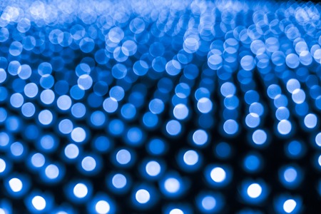 Abstract bokeh background. Soft defocused lights. Neon basic blue colorの写真素材