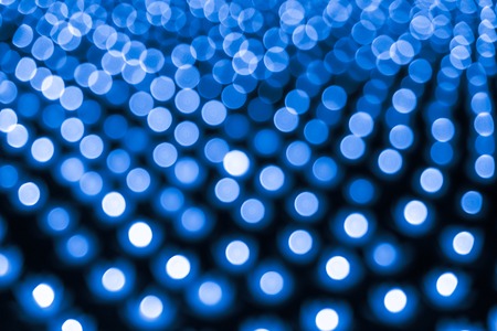 Abstract bokeh background. Soft defocused lights. Neon basic blue color