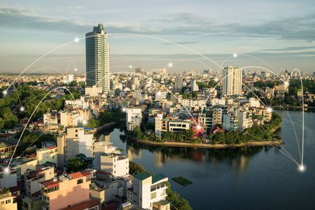 Smart city and wireless communication network concept. Digital network connection lines of Hanoi city at West Lake or Ho Tayの写真素材