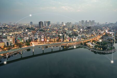 Smart city and wireless communication network concept. Digital network connection lines of Hanoi at Hoang Cau lakeの写真素材