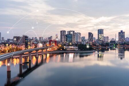 Smart city and wireless communication network concept. Digital network connection lines of Hanoi at Hoang Cau lakeの写真素材