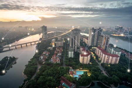Smart city and wireless communication network concept. Digital network connection lines of Hanoi city, Vietnam at Linh Dam peninsula, Hoang Mai districtの写真素材