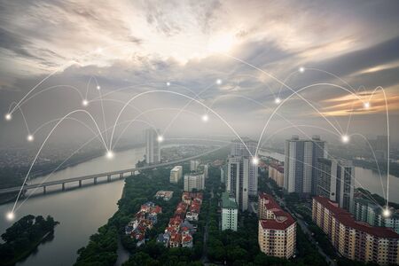 Smart city and wireless communication network concept. Digital network connection lines of Hanoi city, Vietnam at Linh Dam peninsula, Hoang Mai districtの写真素材