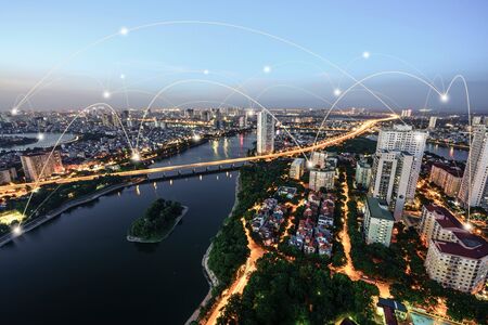 Smart city and wireless communication network concept. Digital network connection lines of Hanoi city, Vietnam at Linh Dam peninsula, Hoang Mai districtの写真素材