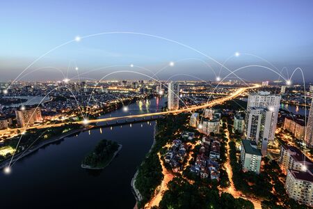 Smart city and wireless communication network concept. Digital network connection lines of Hanoi city, Vietnam at Linh Dam peninsula, Hoang Mai districtの写真素材