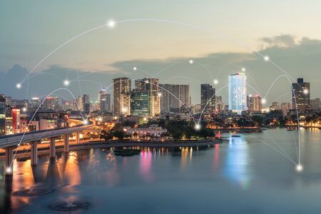 Smart city and wireless communication network concept. Digital network connection lines of Hanoi at Hoang Cau lakeの写真素材