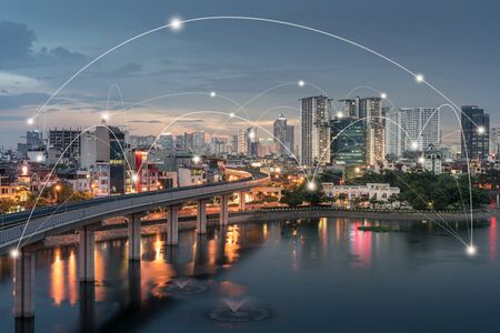 Smart city and wireless communication network concept. Digital network connection lines of Hanoi at Hoang Cau lakeの写真素材