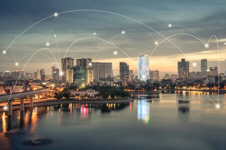 Smart city and wireless communication network concept. Digital network connection lines of Hanoi at Hoang Cau lakeの写真素材