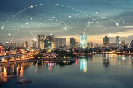 Smart city and wireless communication network concept. Digital network connection lines of Hanoi at Hoang Cau lakeの写真素材