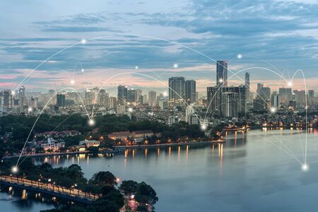 Smart city and wireless communication network concept. Digital network connection lines of Hanoi city at West Lake or Ho Tayの写真素材