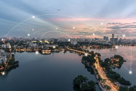 Smart city and wireless communication network concept. Digital network connection lines of Hanoi...