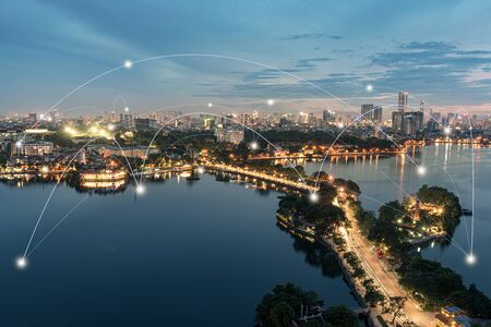 Smart city and wireless communication network concept. Digital network connection lines of Hanoi city at West Lake or Ho Tayの写真素材