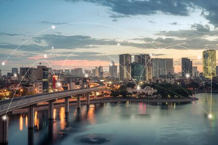 Smart city and wireless communication network concept. Digital network connection lines of Hanoi at Hoang Cau lakeの写真素材
