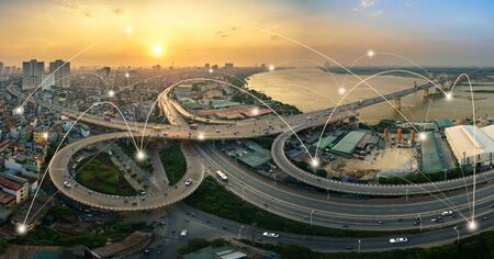 Smart city and wireless communication network concept. Digital network connection lines of Hanoi city at Vinh Tuy bridgeの写真素材