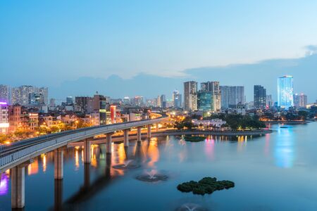 Aerial skyline view of Hanoi at Hoang Cau lake. Hanoi cityscape by sunset period