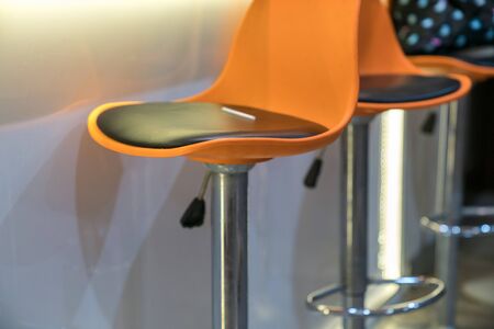 Orange chair for kitchen bar at homeの写真素材