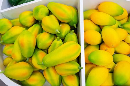 Plastic fruits on model supermarket shelf. Children pay toysの写真素材