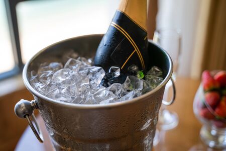 Ice bucket with bottle of chilled champagneの写真素材