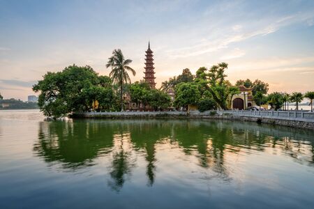 Tran Quoc pagoda, the oldest Buddhist temple in Hanoi, at twilight. The famous destination travel in Hanoiの写真素材