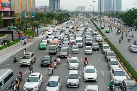Blurred car traffic background in Hanoi street, Vietnamの写真素材