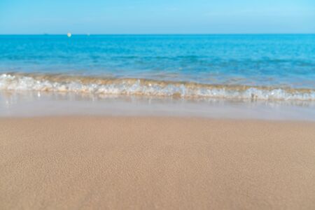Tropical sea beach with sand and wave of the seaの写真素材