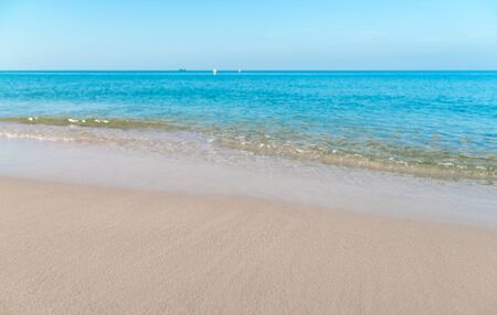 Tropical sea beach with sand and wave of the seaの写真素材