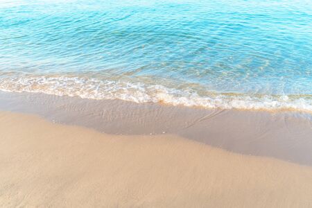 Tropical sea beach with sand and wave of the sea