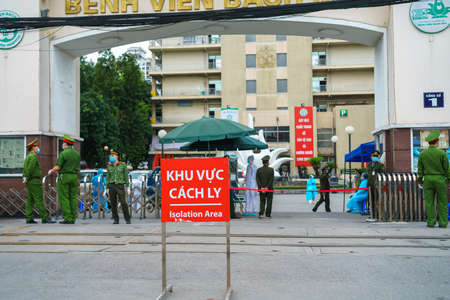 Hanoi, Vietnam - Mar 31, 2020: Isolation or Quarantine sign outside of main entrance of Bach Mai hospital during covid-19 coronavirus pandemicのeditorial素材