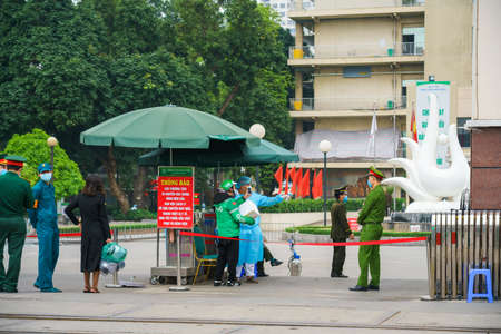 Hanoi, Vietnam - Apr 1, 2020: Main entrance of Bach Mai hospital, locked down as a major Covid-19 outbreak area, during covid-19 coronavirus pandemicのeditorial素材