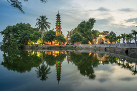 Tran Quoc pagoda during sunset time, the oldest temple in Hanoi, Vietnam. Hanoi cityscape.の写真素材