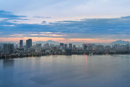 Aerial view of Hanoi skyline at West Lake or Ho Tay. Hanoi cityscape at twilightの写真素材