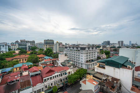 Aerial skyline view of Hanoi city, Vietnam. Hanoi cityscape by sunset period at August Revolution Square, with Hanoi Opera Houseの写真素材