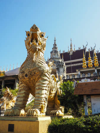 GOLDEN SINGHA IN WAT PHRA THAT SUTHON THAILANDの写真素材