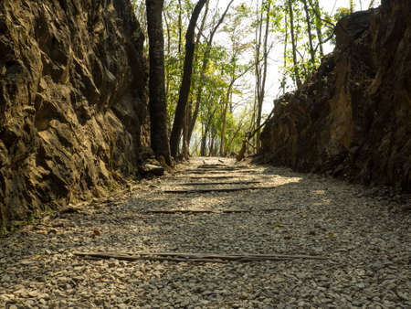 HISTORIC WOODEN RAILWAY PASSING DEATH VALLEY IN THAILANDの写真素材