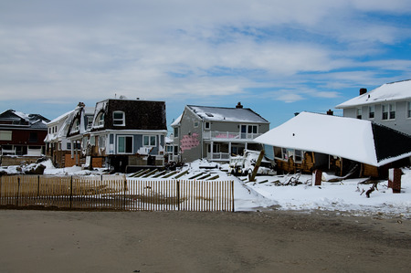 Six months after Hurricane Sandy's storm surge destroyed countless homes along the Rockaway coastline, the area is still rebuilding.の写真素材