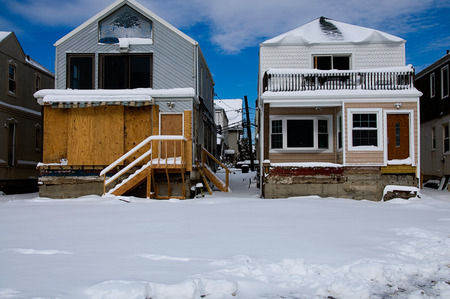 Six months after Hurricane Sandy's storm surge destroyed countless homes along the Rockaway coastline, the area is still rebuilding.の写真素材