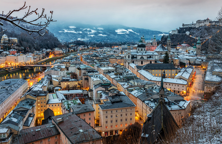 View to the town center of Salzburg, Austrian Alps, early morning in the winter timeの写真素材