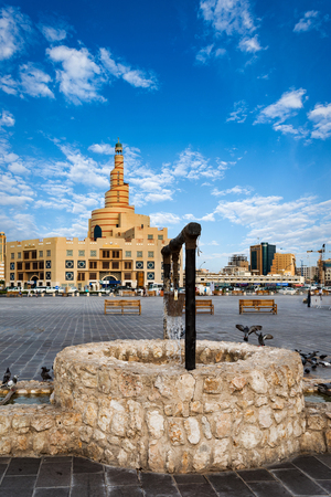 Old well replica in front of the Souq Waqif in Doha, Qatar