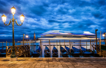 View to San Giorgio Maggiore in Venice, Italy, before sunrise with a passing by cruise shipのeditorial素材