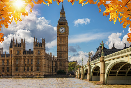 The Big Ben clocktower and Westminster Palace at the Thames river in London on a sunny autumn day, United Kingdomの写真素材