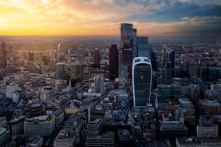 Elevated sunset view of the financial skyscrapers at the City of London, Englandの写真素材