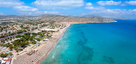 Aerial panorama of the turquoise sea of the holiday suburb Varkiza Beach at the south coast of Athens, Attica, Greeceの写真素材