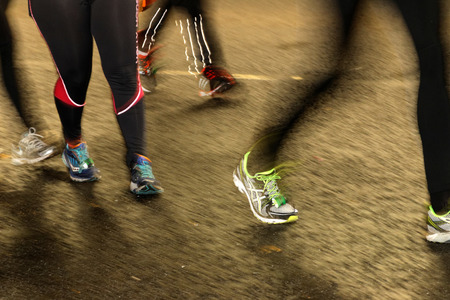 STOCKHOLM - NOVEMBER 22: Running feet and legs in the Tunnel Run (10 km) in Stockholm, Swedenのeditorial素材