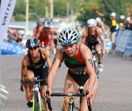 STOCKHOLM - AUG 23: Santos (POR) and Hewitt (NZL) cycling after the transition zone in the Womenのeditorial素材