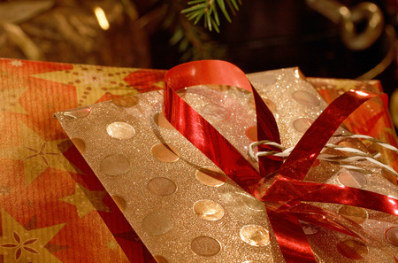 Christmas present below the Christmas treeの写真素材