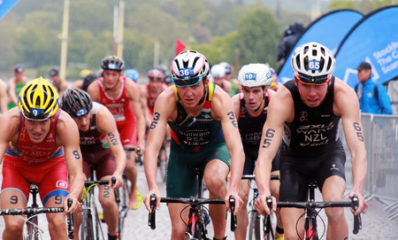 STOCKHOLM - AUG 23, 2014: Triathletes Wian Sullwald (RSA) and Sam Ward (NZL) cycling in the Men's ITU World Triathlon series event Aug 23, 2014 in Stockholm, Swedenのeditorial素材