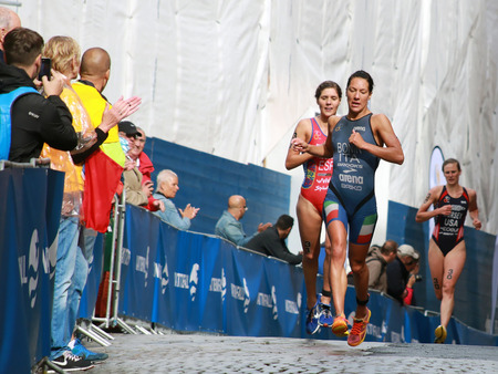 Charlotte Bonin (ITA) one meter before Carolina Routier (ESP) in the Women's ITU World Triathlon series event Aug 23, 2014 in Stockholm, Swedenのeditorial素材