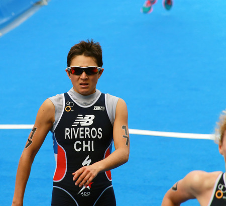 STOCKHOLM - AUG 23, 2014: Barbara Riveros Diaz (CHI) seconds after the finish after the race Women's ITU World Triathlon series event August 23, 2014 in Stockholm, Swedenのeditorial素材